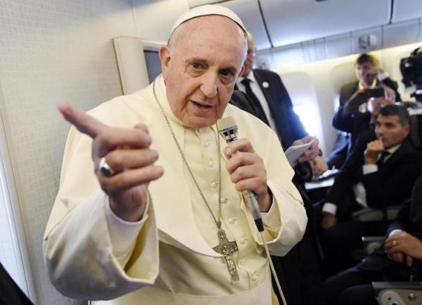 Pope Francis holds an in-flight press conference.